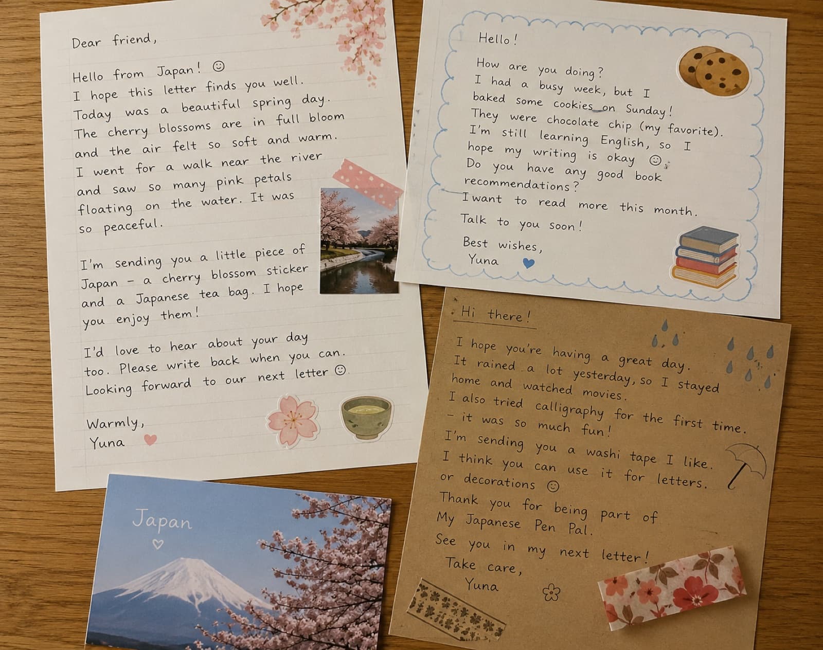 Sample letters with a postcard, cherry blossom stickers and washi tape on kraft paper